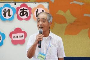 あいさつをしている岩永会長の写真