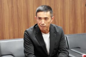 報告をしている仲井代表取締役の写真