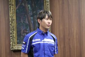 結果ほうこくをしている将人さんの写真