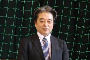 稲林専務理事のあいさつの様子