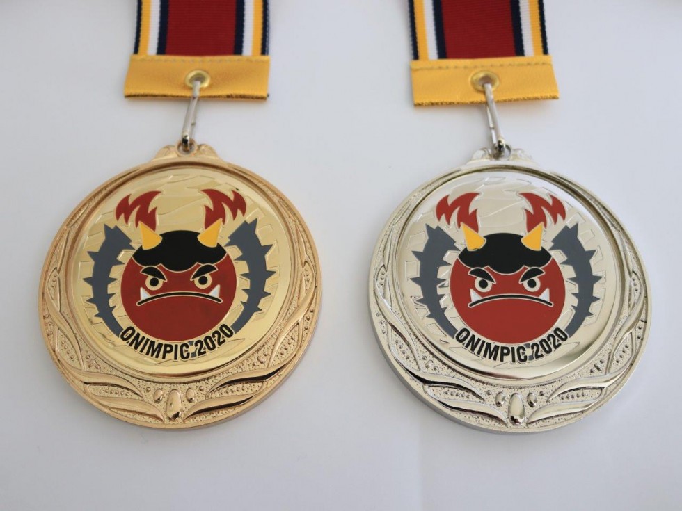 完成した鬼んぴっくメダル（金、銀の2種類）の画像